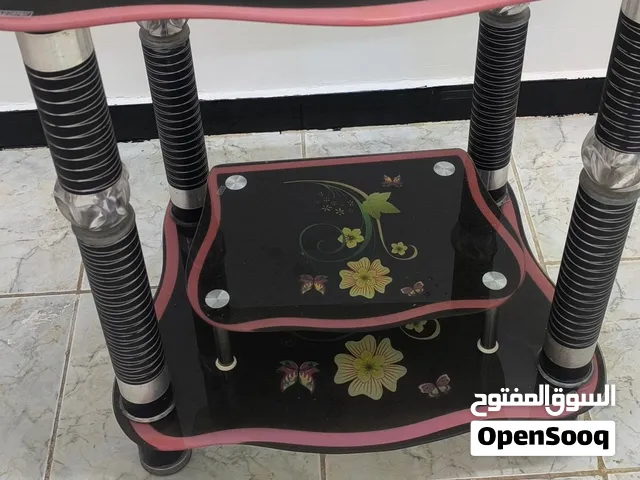 طاولة زجاجية متعددة الأدوار