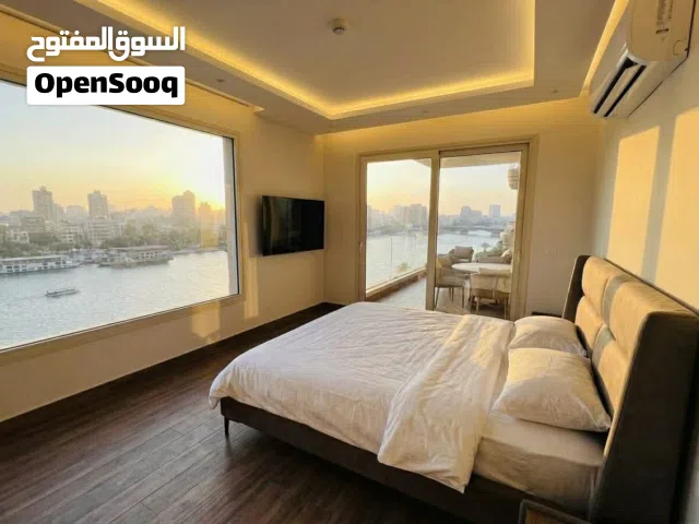 أمتلك وحدة فندقية مفروشة ومتأجرالك فـ الشهر بـ 155ألف بعقد موثق 100% فيو خيالي عـ النيل والاهرامات