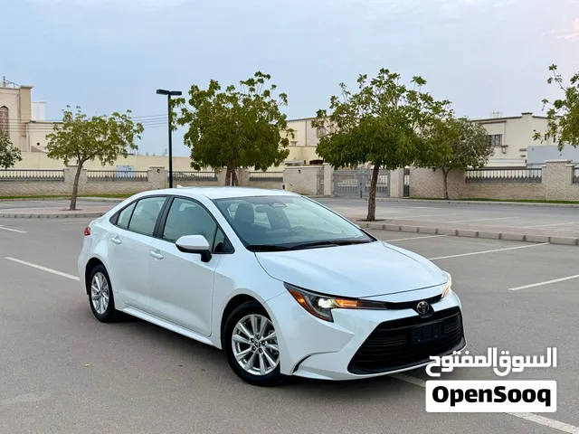 تسجيل جديد تويوتا كورولا 2024 La أبيض لؤلؤي مسرفسه وجاهزه للاستخدام