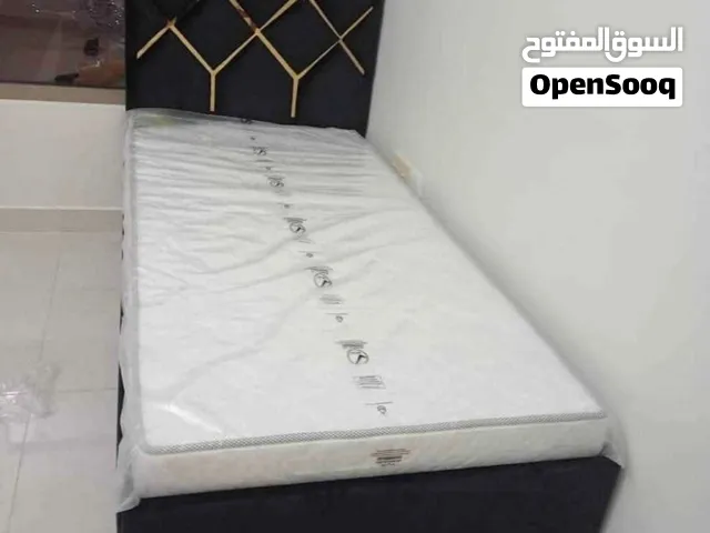 Selling brand new single bed with mattress
