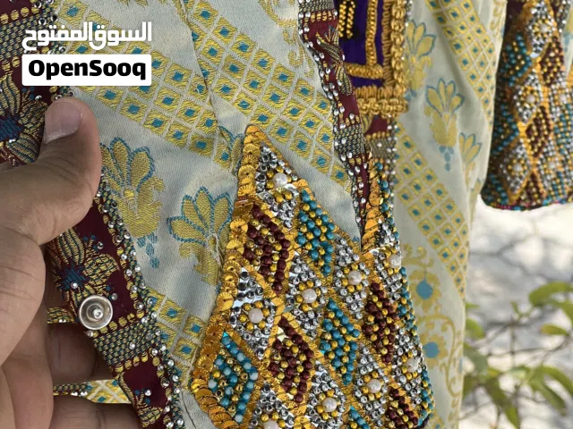 للبس عماني اصيلي بجميع مستلزماته