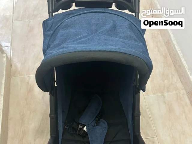 عربانة اطفال من جونيورز شبه جديده وحتى الكتالوج فيها  trolley for baby from juniors