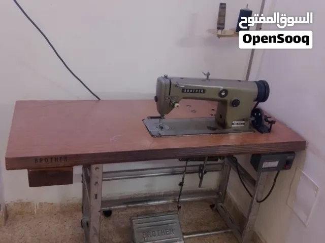 ماكنة خياطه ملابس ياباني