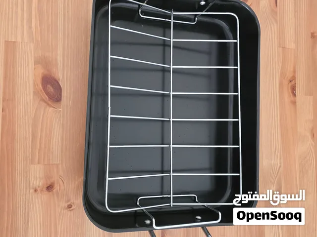 صينية تحمير وشواء (روستر) مع شبك داخلي بحالة ممتازة للبيع