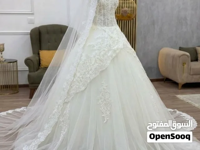 فستان زفاف كويتي مستعمل مرة واحدة وياه طرحة طويلة