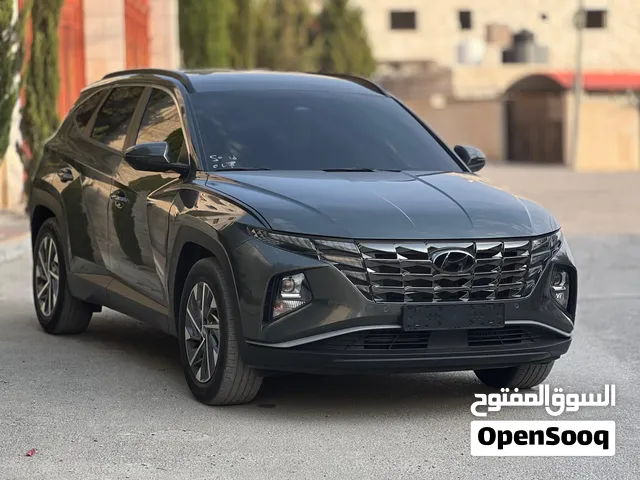 هونداي توسان هايبرد ترخيص 2023 فل اضافات بدون فتحه باللون المميز بالسعر المميز