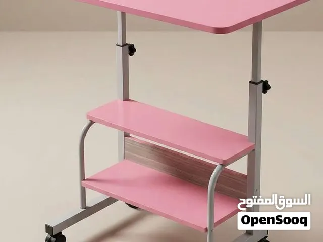 طاولة ميز متحركة ومتعددة الاستخدامات  السعر 52 الف توصيل مجاني لجميع انحاء العراق تعديل الارتفاع