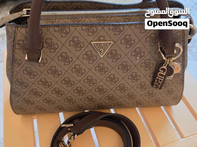 brown GUESS for sale  in Muscat