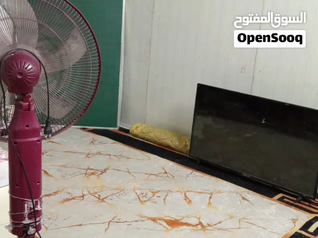 محلات مع بيت للبيع