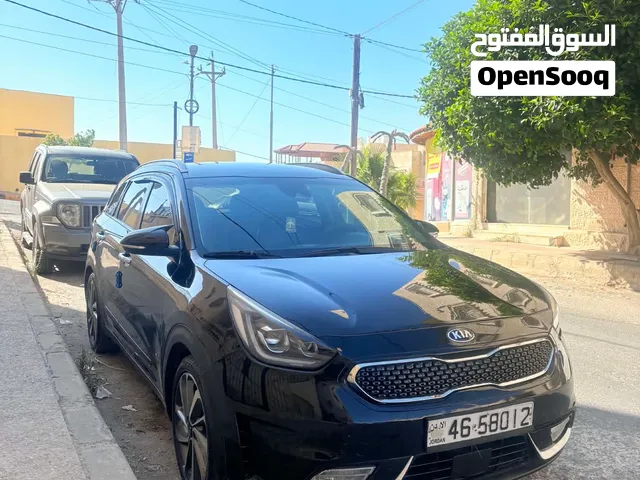كيا نيرو موديل 2018 أعلى صنف عدا الفتحه وارد الشركه بصمه تشغيل بصمه ابواب تحكم طاره رادار مانع تصادم