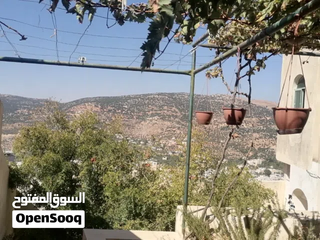 بيت مستقل طابقين / أجمل اطلالة على جبال عجلون في لواء كفرنجه ( اقرأ الوصف بالإعلان)...