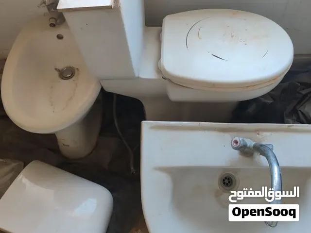 طقم حمام مع مواسير