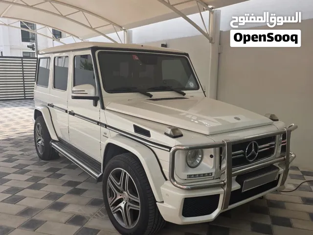 Mercedes-Benz G63 AMG  GCC Specs  White / Red & Black Leather
