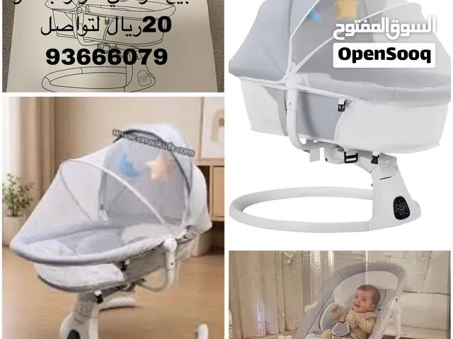 كرسي أطفال هزاز كهربائي