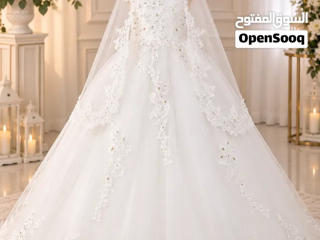 فستان زفاف  مع الطرحه والحزام استعمال مره وحده فقط