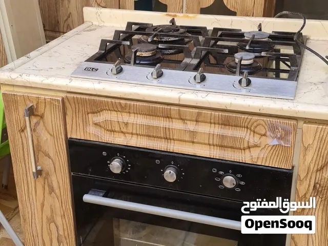 طباخ غاز مع فرن كهرباء مع مرشحة