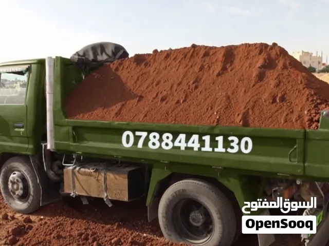 يتوفر تراب احمر زراعي قلاب  2 متر  قلاب  3 متر  تراب نظيف للحدائق واحواض الزريعه
