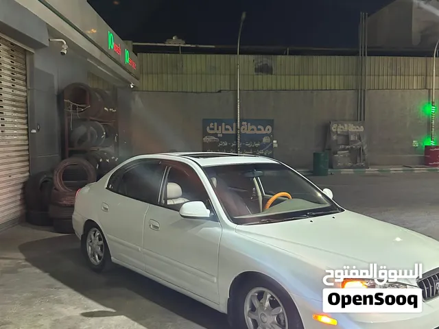 هونداي اكس دي موديل 2003 جولد اعلى صنف مع فتحه كهرباء ثلاث حركات