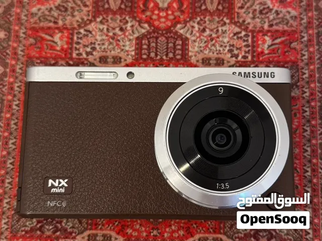 كاميرا Samsung NX Mini للبيع بحالة ممتازة مع ملحقاتها