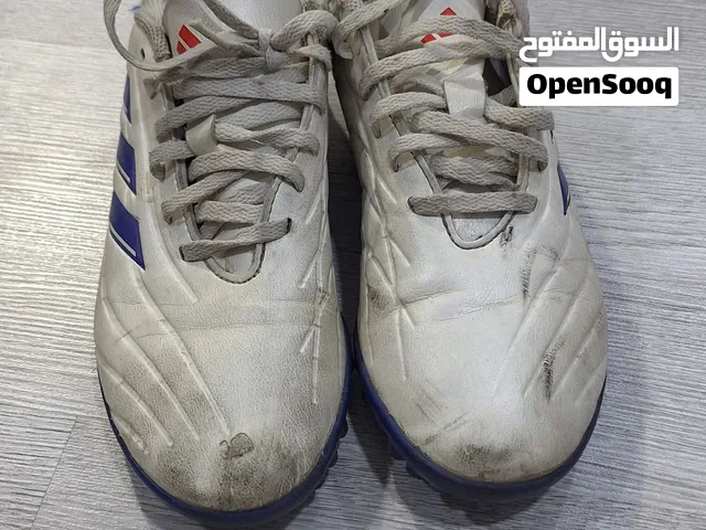 white copa pure football shoes