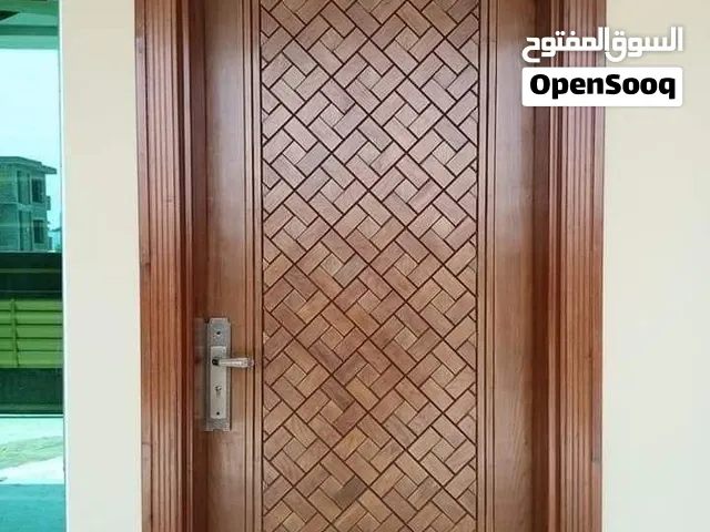 أبواب خشب داخلية تفصيل عماني فخمة وتصاميم راقية