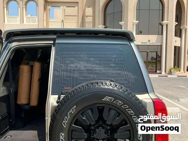 نيسان باترول 2018 ذهبي مستعمل، SUV خليجي، 7 مقاعد، ديزل، بحالة ممتازة