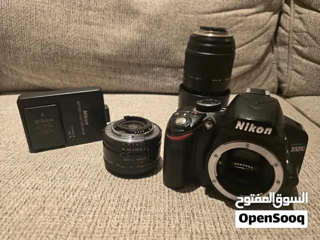 كاميرا Nikon D3200 مع عدسة 50mm وعدسة Tamron 70-300mm + شاحن