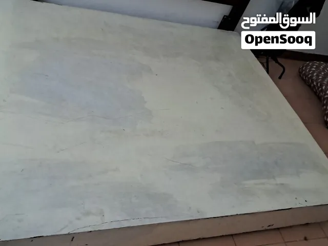 large-size bed and a sofa are available for sale.
