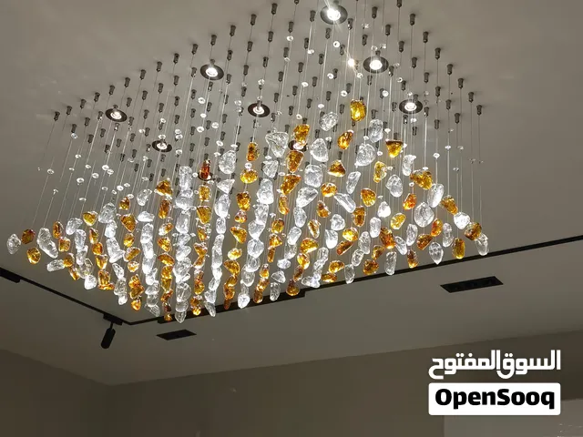 عمل ثريات الحجر الحديث بكل التصاميم الحديثه