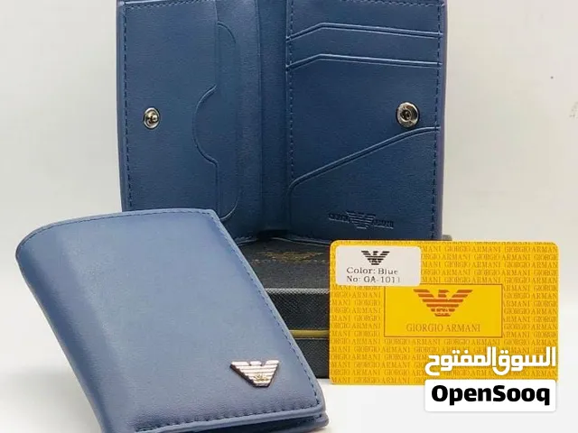 محـافظ النقـود والبطـاقات.