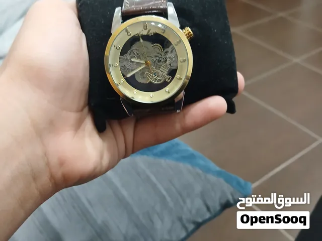ساعه مكانيكي جميله جدا و جديده مع الضمان