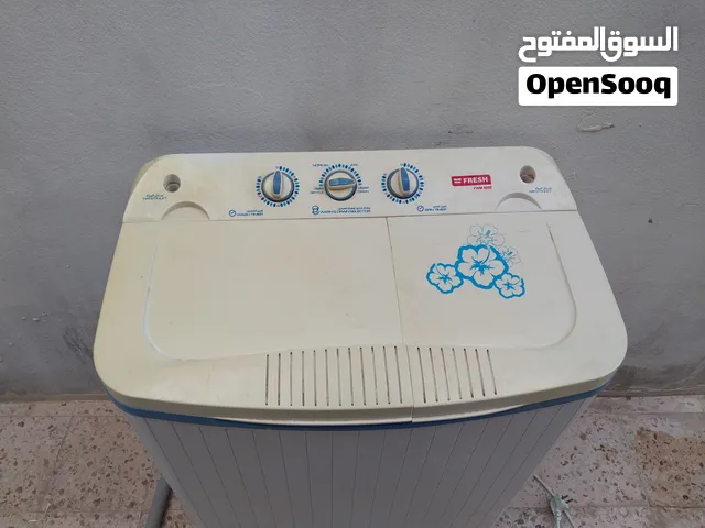 غسالة ملابس عادية
