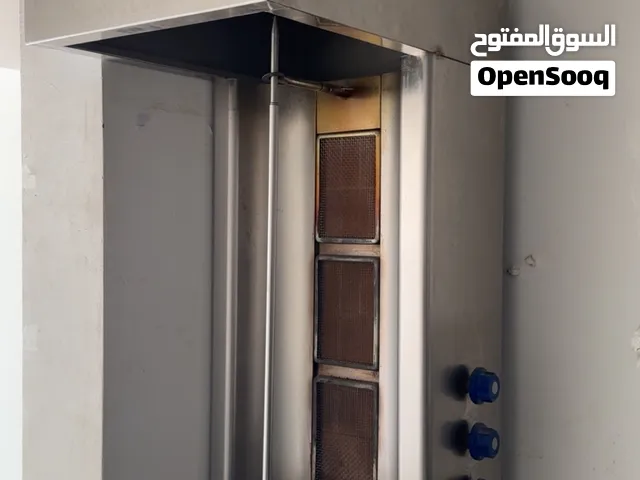 مكينة شوارما. وطاولات ستان ستيل دبل