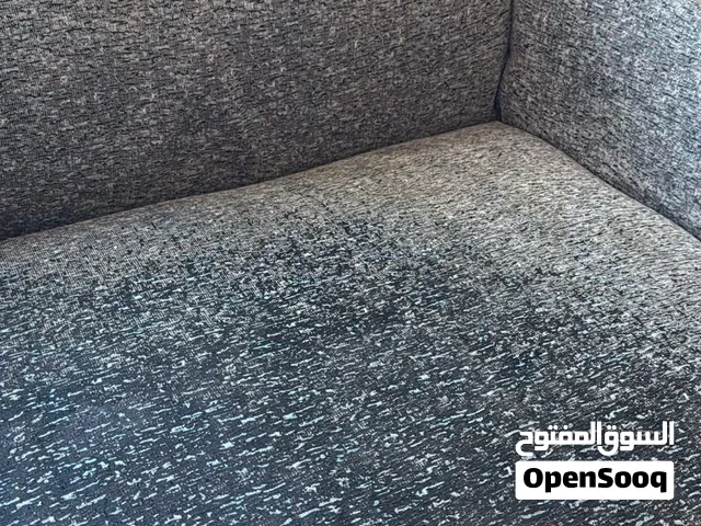 I have a sofa set—one 3-seater and one 2-seater—for urgent sale at 250 Dirhams.