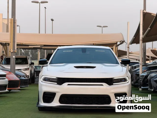 دودج تشارجر سكات باك موديل 2020 اوراق جمارك فل اوبشن بحالة ممتازة قراءة العداد 127000KM