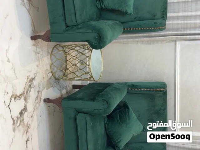 كرسي بذراعين