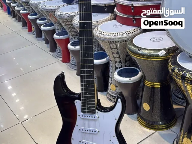 جيتار الكترك كهربائي احترافي خشب ممتاز لون بتي مع اسود مع شنتة وسلك جك وامبليفاير متوفر توصبل