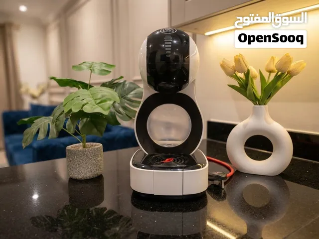 ماكينة قهوة نسكافيه دولتشي غوستو (NESCAFÉ Dolce Gusto)