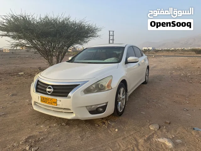 نيسان التيما 2015 موديل SL Turbo صالون بيج مع حساسات وفتحة بانوراما مرخصة