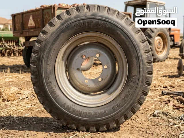 إطار زراعي ميطاس Mitas بحالة ممتازة مع الديسك (مقاس 12.5/80-18)