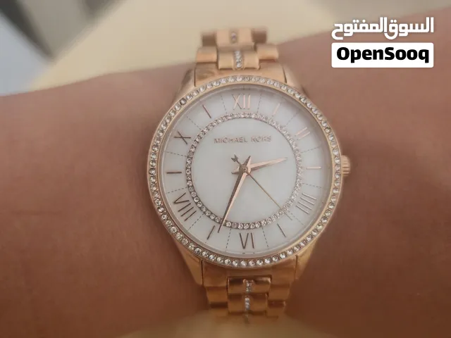 ساعة مايكل كورس