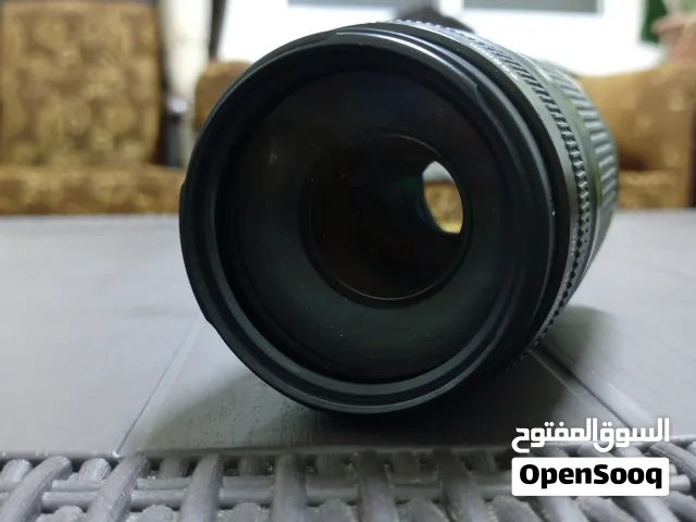 عدسة كانون بحالة الوكالة وسعر حرق حرق القياس 70-300 زوم رهيب وبسعر حرق الحرق العدسة وكالة لسا