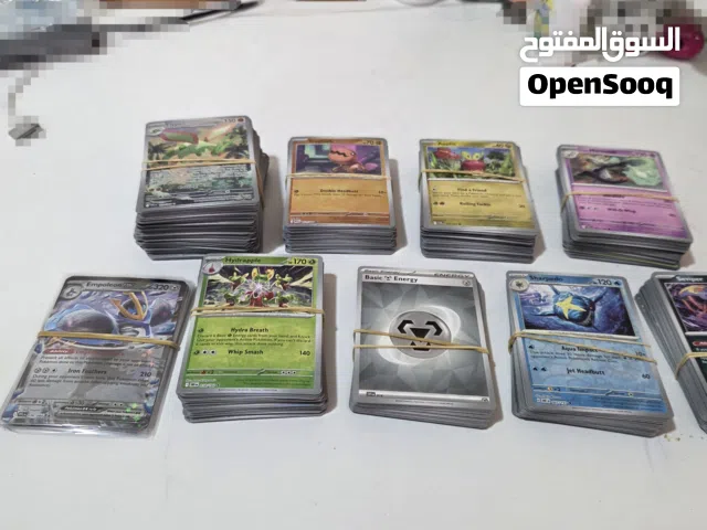 517 pokemon cards including ten EX cards and multiple normal shiny cards + a good condition binder