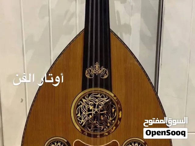 عود  صناعة  أوتار الفن  ( تفصال )