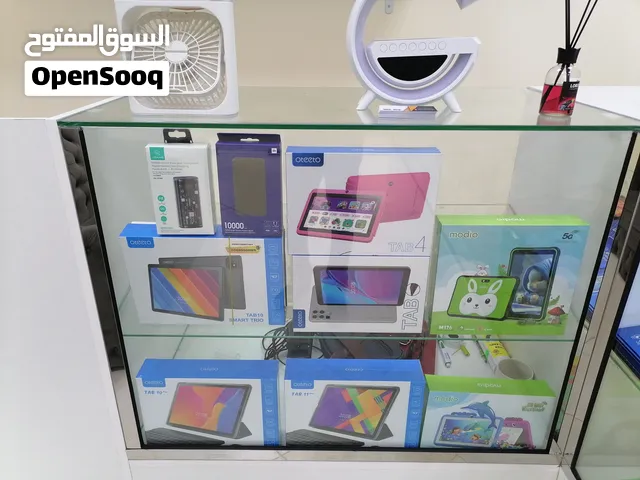 محل بيع هواتف متنقلة وحاسب آلي