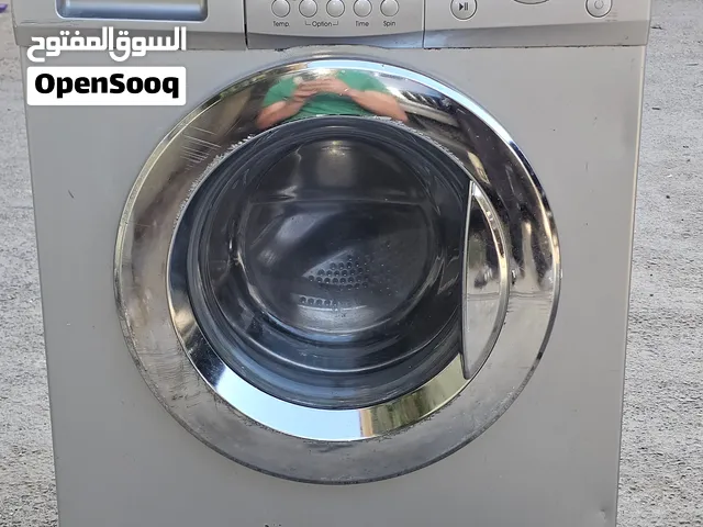 غسالة الجي 7K لون سيلفر
