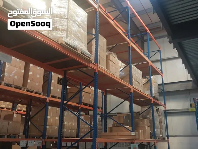 Used heavy-duty warehouse pallet racking systems and accessories for sale.