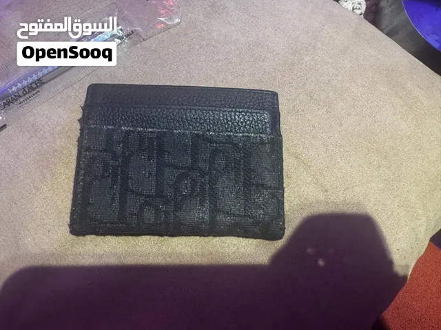 جزدان ديور اصلي مستعمل بحالة جيدة جداً