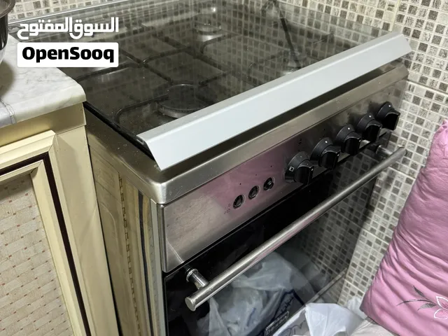 البيع طباخ ديكسون ايطالي نظيف جدا 4 عيون وغسالة سامسونج