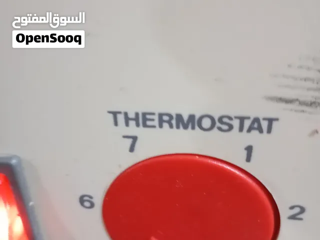 مدفأة زيت تعمل على الكهرباء